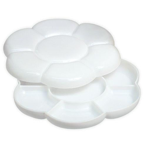 Stack of plastic daisy palettes