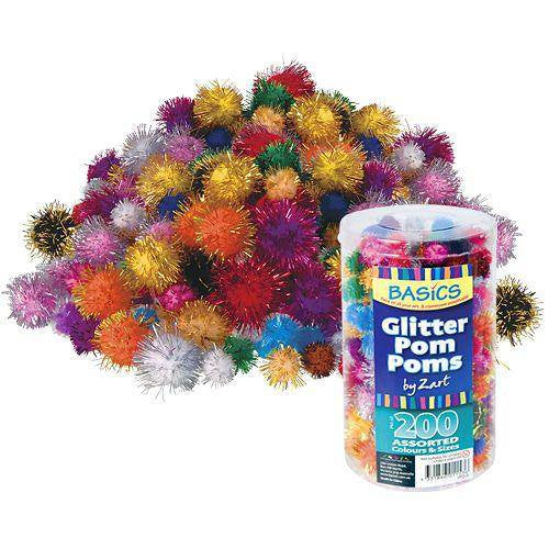 Pile of Zart Basics glitter pom poms beside the tub